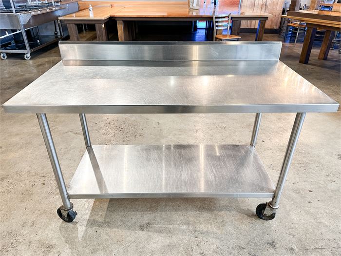 60" Stainless Table on Casters With 4" Backsplash