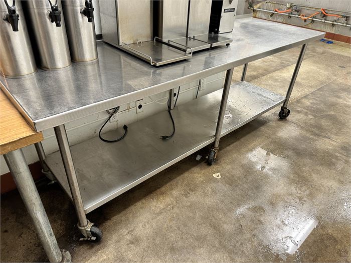 96" Stainless Table on Casters With Backsplash