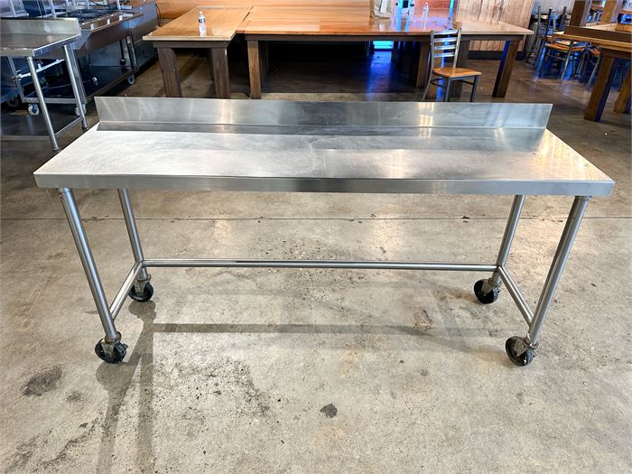 72" Stainless Table on Casters With 4" Backsplash
